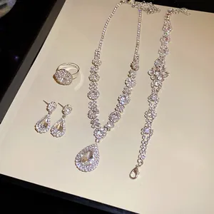 Elegant luxury rhinestone teardrop pendant necklace with matching earrings bracelet and ring set