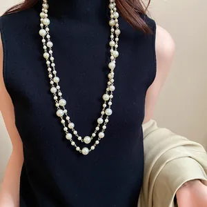 Elegant French retro double-layer long pearl necklace detail for a classy look.