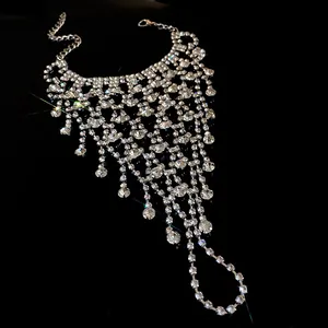 Detailed close-up view of super shiny rhinestone multi-layered fringe hand chain harness