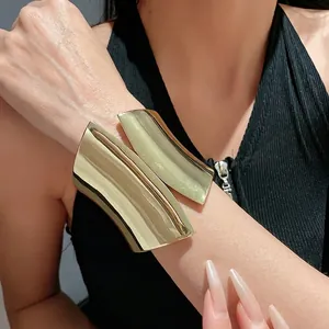 Luxury bold and stylish wide asymmetric open gold cuff bracelet for fashionable women