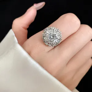Detailed view of a vintage luxury flower ring decorated with sparkling cluster rhinestones