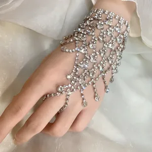 Sparkling rhinestone multi-layer tassel hand chain with intricate mesh design