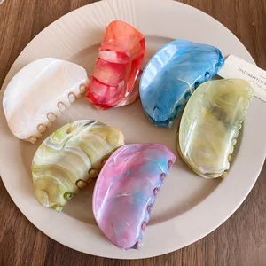 Elegant set of six marbled acrylic oval hair claw clips in vibrant pastel assorted colors