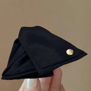 Elegant black fabric triangular hair claw clip for stylish autumn and winter updos