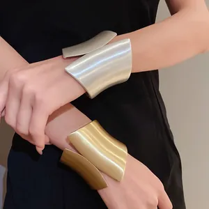Modern wide asymmetrical open cuff bracelets with premium matte gold and silver finish