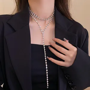 Elegant layered rhinestone Y-necklace choker with long drop shown on a fashion model