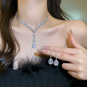 Detailed view of elegant sparkling zircon water drop necklace and matching earrings set