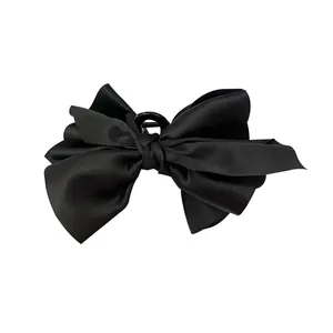 Elegante pinza per capelli con fiocco in raso nero per acconciature femminili chic