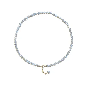 Elegant French Baroque pearl necklace with a gold clasp on a plain white background