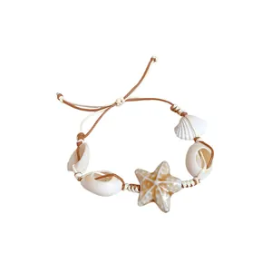 Handmade seashell and starfish charm bracelet with adjustable braided cord for summer beach