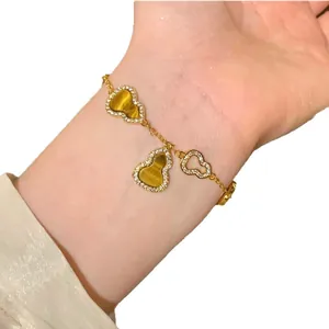 Bracelet calebasse style chinois avec œil de tigre et zircons pour femmes