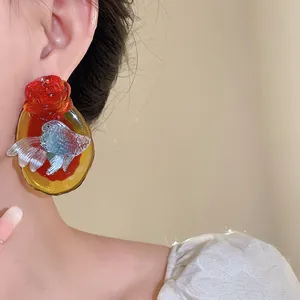 Detailed view of New Chinese style resin earrings featuring koi fish and flower design