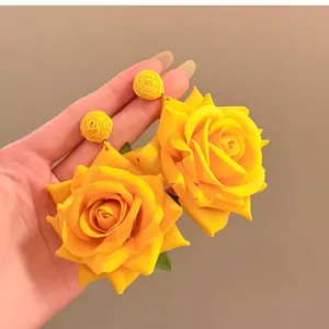 Hand-held large yellow raffia flower drop earrings with silver needle