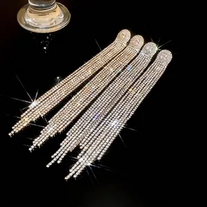 Elegant long rhinestone tassel earrings with sparkling oval cubic zirconia studs