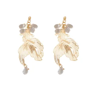 Elegant new Chinese style goldfish earrings with grey teardrop beads on white background