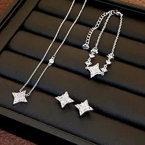Silver star pendant jewelry set including necklace, bracelet, and stud earrings
