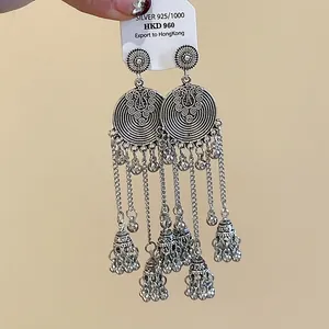 Vintage Bohemian silver tassel earrings with ethnic bell drop design