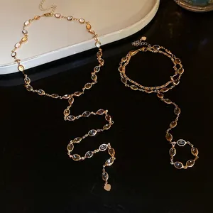 Vintage resin oval tassel necklace and jewelry set with an elegant golden finish