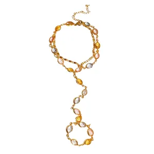 Elegant vintage resin oval gemstone tassel necklace with golden chain link design