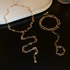 Close-up of retro colorful resin oval stone tassel necklace and bracelet set