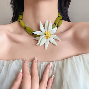 Exquisite large white flower necklace with olive green beads perfect for summer beach vacations