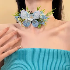 Detailed view of a sweet blue fabric flower and butterfly hair clip for women's hair
