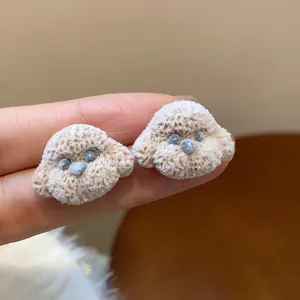 Fluffy cream-colored poodle dog stud earrings with soft velvet texture for women