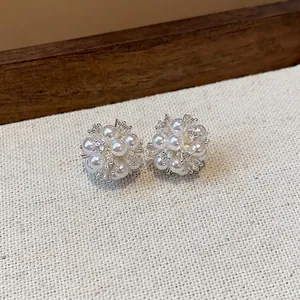 Elegant silver flower cluster stud earrings with zircons and pearls for a luxury look