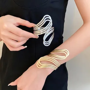 Elegant geometric hollow cuff bracelets with matte texture in gold and silver tones
