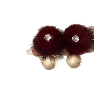 Elegant burgundy fur pom-pom earrings with zircon center and hanging white pearls