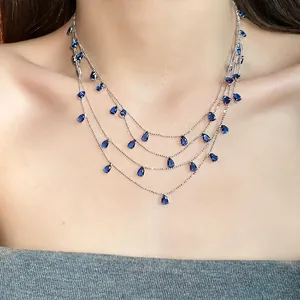 Elegante collar de plata multicapa con colgantes de circonita de gota de agua azul
