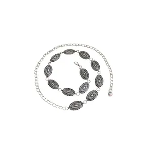 Vintage ethnic style metal waist chain belt featuring detailed engraved oval concho medallions