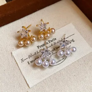 Elegant star-shaped zircon earrings with three dangling pearls on S925 silver needles.