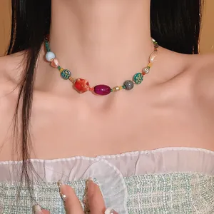 Close-up of vibrant ceramic and glass bead choker necklace for a sweet summer look