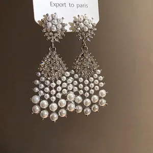 Ornate French retro waterdrop earrings featuring pearls and diamonds on silver needles