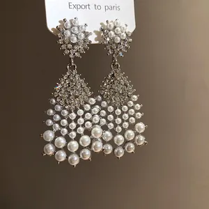 Elegant vintage drop earrings with shimmering rhinestones and white pearls for women