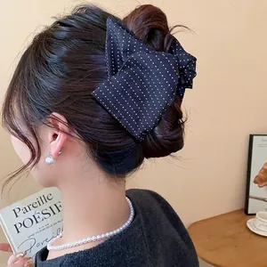 Élégante pince à cheveux à nœud noir à pois pour décoration de coiffure de femme