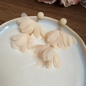 Elegant cream fabric flower drop earrings featuring a woven ball stud for summer style