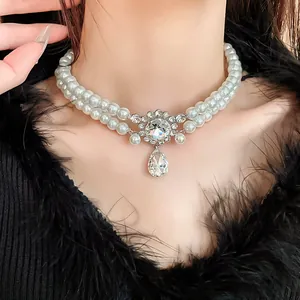 Macro view of French vintage double-layer pearl necklace with water-drop crystal