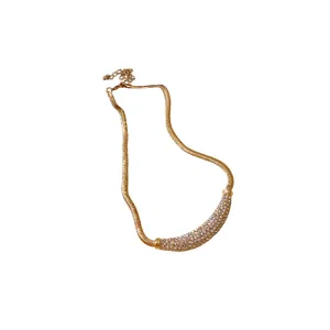 Elegant gold snake chain necklace with a curved rhinestone crescent pendant for women