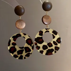 Vintage Maillard style leopard print earrings with decorative wooden disc accents