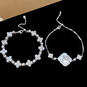 Silver-toned zircon flower bracelet set with clover motif and mother-of-pearl