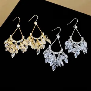 Elegant 18k gold plated zircon teardrop tassel earrings in gold and silver finish