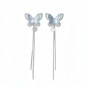 Elegant silver butterfly tassel clip-on earrings with blue gradient enamel inlay