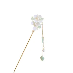 Elegant Chinese style floral hairpin with delicate pearls and light green tassel decoration