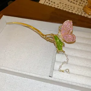 Elegant Chinese style butterfly hair stick with pearls and tassels on a gold metal stem