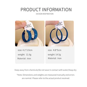 Comparison of two sizes for Klein blue round hoop earrings with detailed specifications.