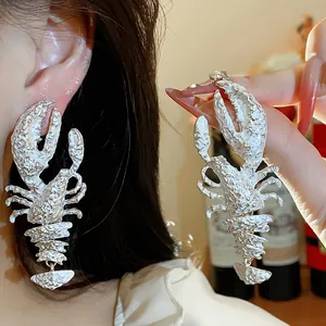 Statement textured silver lobster earrings for women with unique fashion design