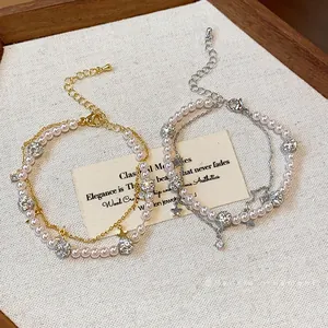 Elegant double-layered pearl and zircon star bracelet for women in gold and silver finish