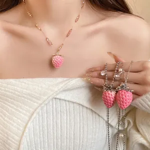 Sweet pink resin strawberry pendant necklace with heart and star charms for women